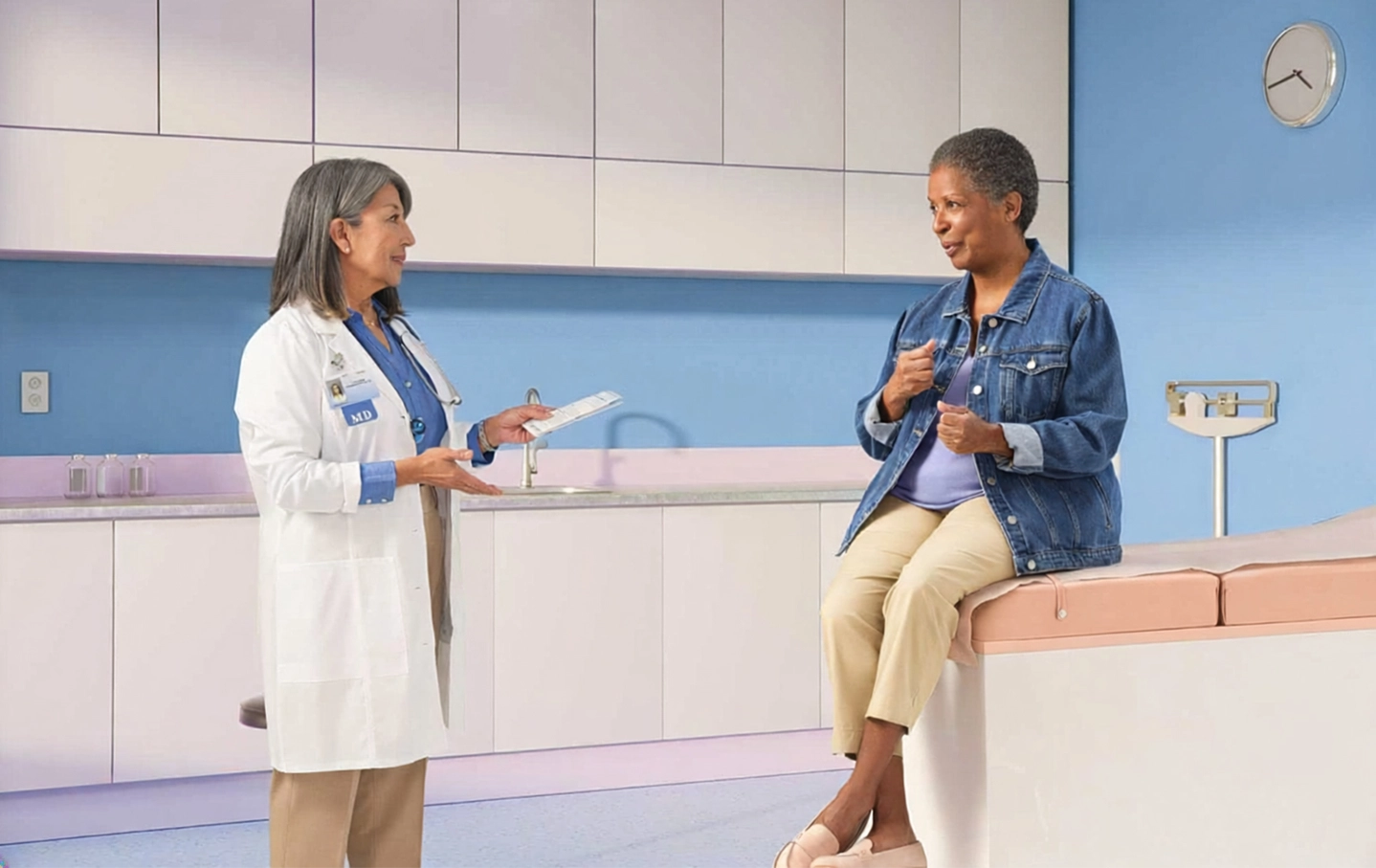Doctor speaking with patient about OIC symptoms